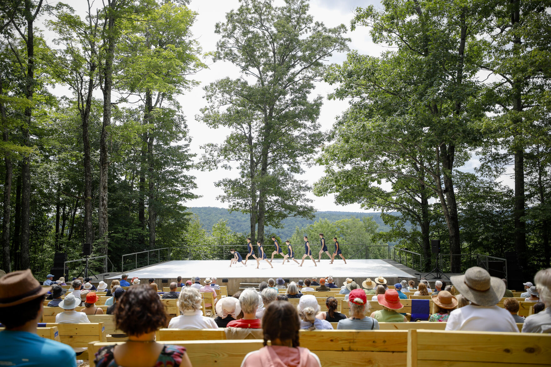 dancers perform at outdoor stage